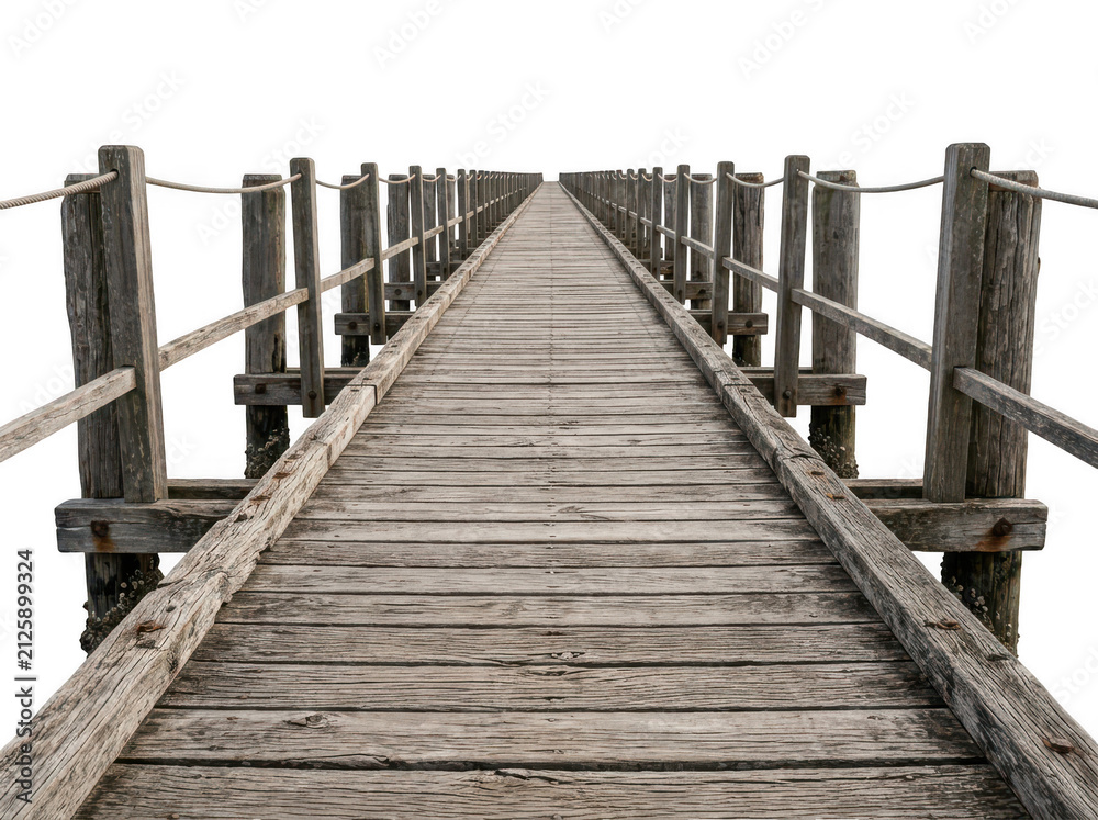Obraz premium Wooden pier extending into calm water. Long weathered dock with metal railings leading to horizon.