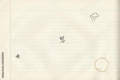 Minimalist hand-drawn pencil sketches of cloud rain star heart and coffee ring on lined