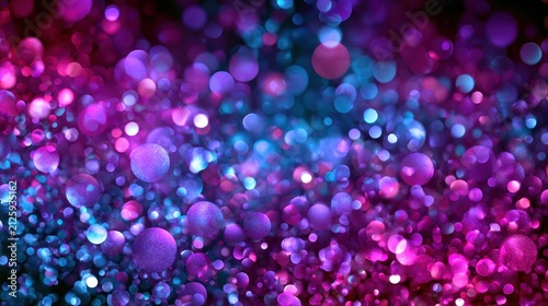 Abstract bokeh lights in vibrant purple and blue hues festive background