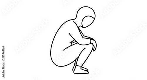Person sitting in a squatting position.