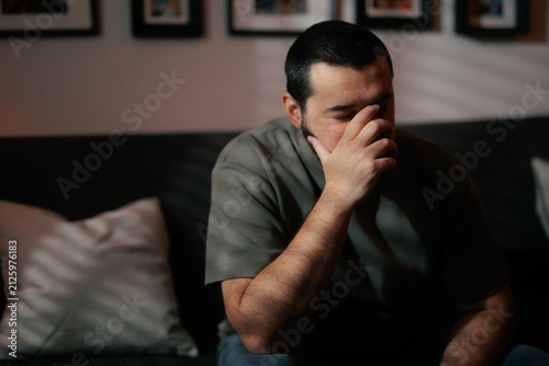 Photography Sad Man Making Facepalm Gesture Sitting Worried On Couch