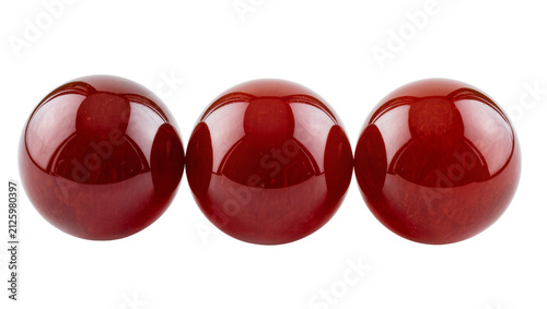 Bild auf Leinwand Three polished carnelian beads with natural wood grain texture, isolated on tran