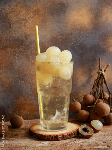 Iced longan juice drink with fresh longan fruits. Refreshing drinks for summer