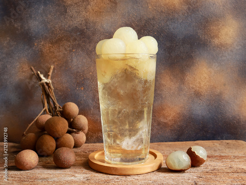 Iced longan juice drink with fresh longan fruits. Refreshing drinks for summer