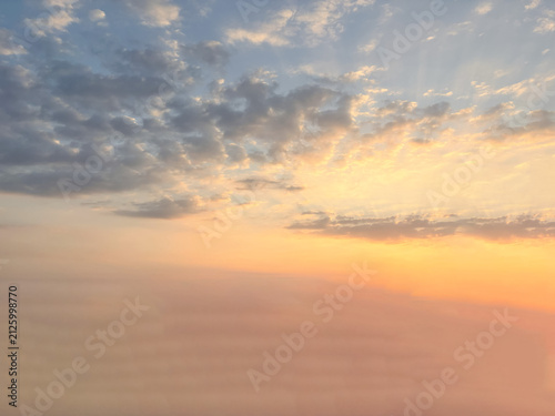 Foto Dramatic Sunrise Sky Transitioning from Blue to Gold