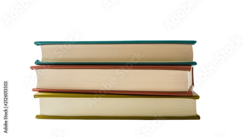 Photography Stack of three hardcover books with teal brown and green covers, isolated on tra