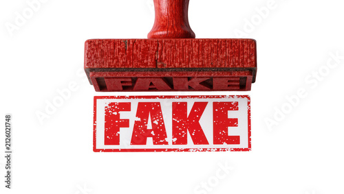 Canvas Print Red wooden rubber stamp imprinting the word FAKE, isolated on transparent backgr