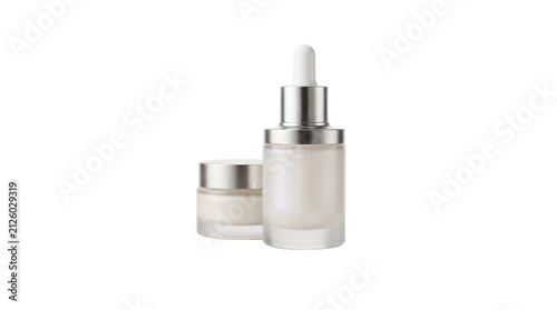 Luxury cosmetic glass bottle with dropper and face cream jar, premium skincare packaging set, elegant beauty product containers for serum and moisturizer isolated PNG with Transparent Background