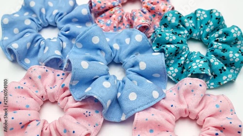 Colorful scrunchies on white background.