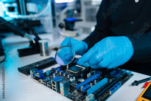 Close-up of semiconductor microchip on circuit board, motherboard processor for computer repair, hardware technology and chip manufacturing industry concept.