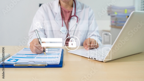 Cuadro en lienzo doctor working on the table, examine the concept of finding information and documents in hospital room
