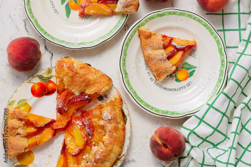 Peach galette cut into pieces.top veiw.