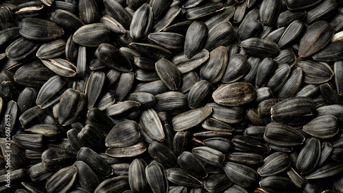 фотографія Roasted sunflower seeds with shell fill the entire frame