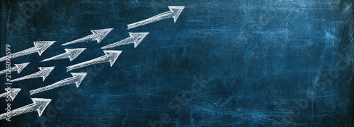 White arrows advance across a dark, textured blue background