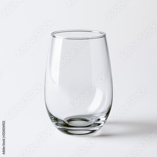Clear stemless wine glass isolated on white background with studio lighting