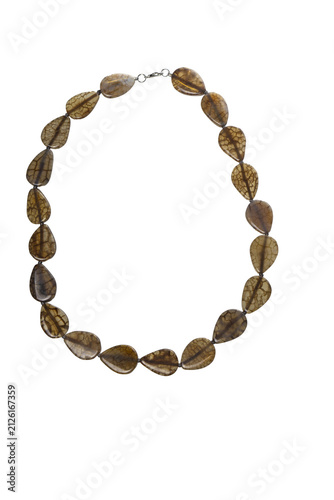 Beads made of green marsh stone on a white background.