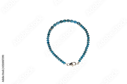 A stone bracelet, blue and dark blue, on a white background.