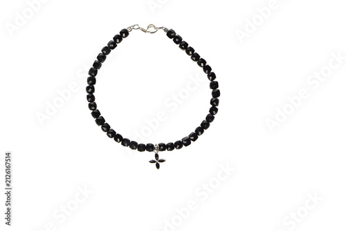 Black stone bracelet with a pendant, women's hand jewelry on a white background.