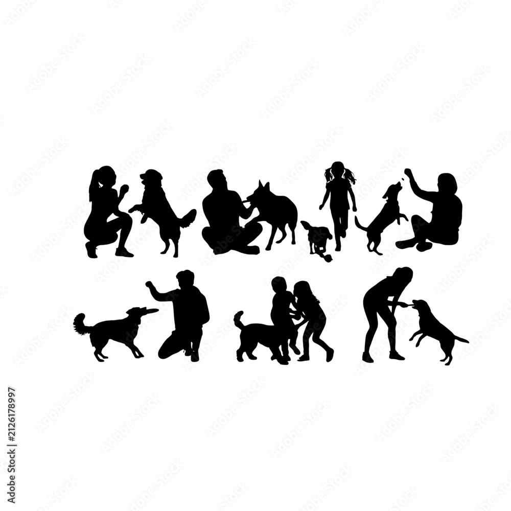 Obraz premium Silhouettes of people and dogs playing together