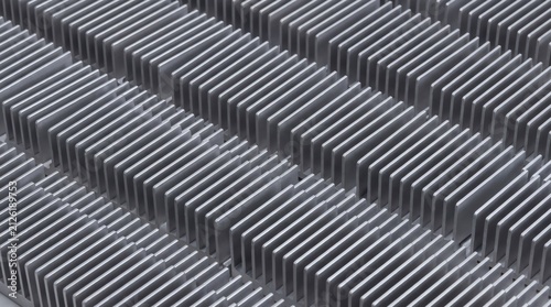 Close up view of an aluminum heat sink cooling fins texture.