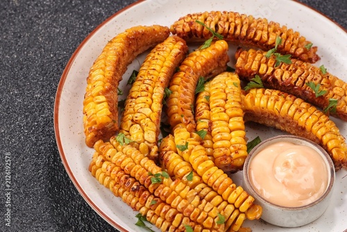 Bild auf Leinwand Corn ribs are processed grilled corn that is shaped like ribs.