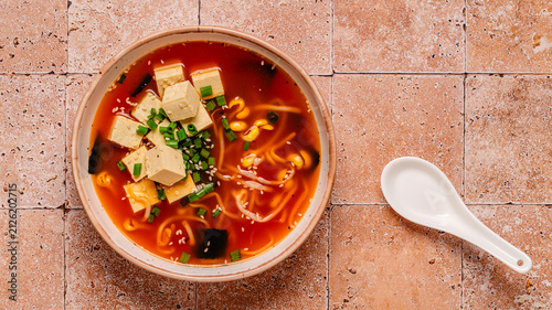 фотографія Spicy miso soup with tofu and bean sprouts