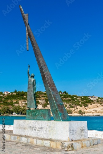 Bild auf Leinwand Pythagoreio, Greece - August 1, 2026: View of the Pythagoras Monument in Pythagoreio on Samos Island, showing the iconic statue by the sea, geometric design, and waterfront setting