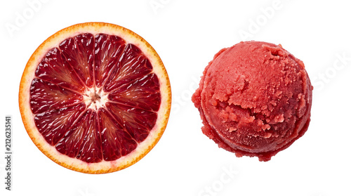 Blood orange slice beside a scoop of deep red blood orange sorbet viewed from above, isolated on transparent background