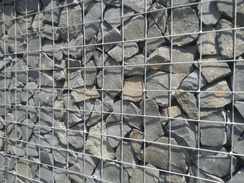 Konstfotografi Modern Gabion Retaining Wall Made of Metal Cage and Grey Stones