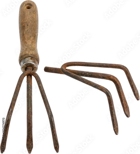 Foto Old rusty three prong hand rake garden tool