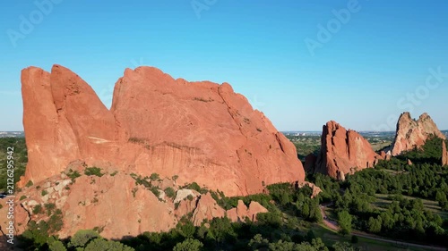 Drone flying slowly towards huge rock cliff in Colorado Springs