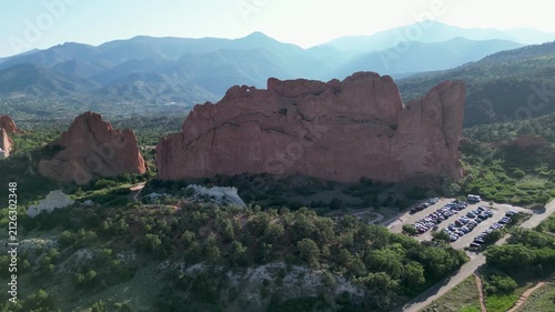 Aerial view flying away from Garden of the Gods rock formation 