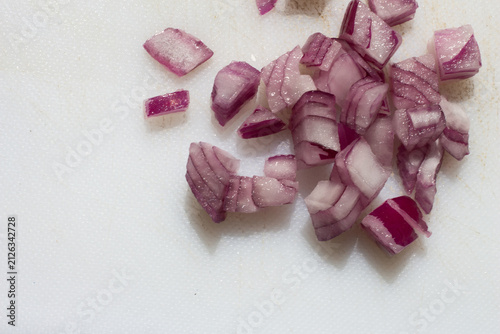 Macro view of chopped red onion pieces