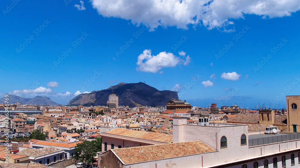 Obraz premium Panoramic rooftop view over historic city roofs and Monte Pellegrino in Palermo, Sicily, Italy