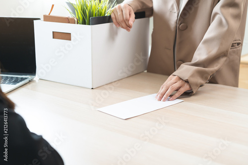 Bild auf Leinwand Unemployment quitting job, desperate asian young business woman send resignation