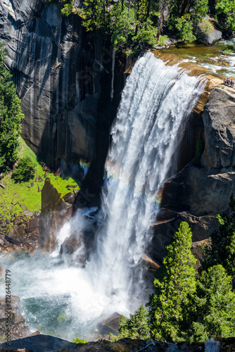 Majestic Nevada Fall with rainbow mist and granite cliffs in Yosemite National Park, California, USA