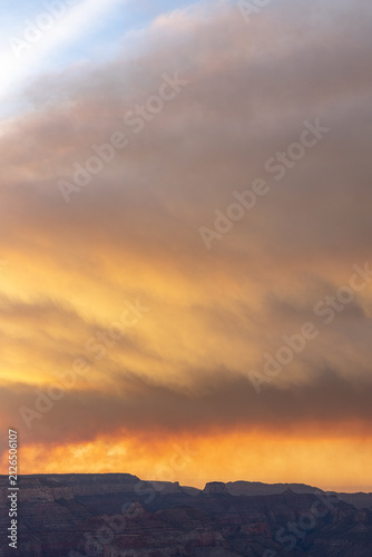 smoke over grand canyon at sunset vertical