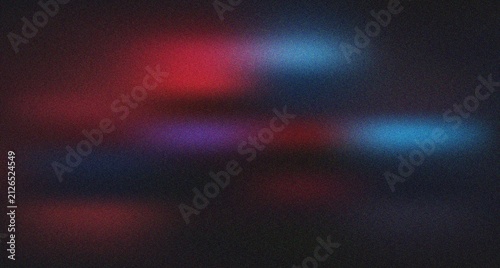 Foto Dark abstract surface featuring blurred red and blue light accents with a distin