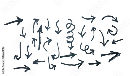 Set of hand drawn sketch arrows on a page