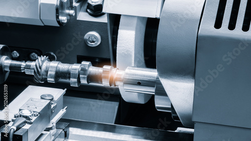Obraz na płótnie Emery grinder processes car crankshaft at car service center