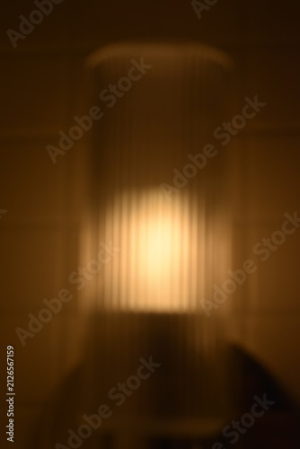 Bild auf Leinwand A dreamy view of a light in the dark.