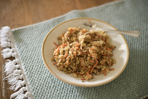 Stir fry plate with lentil sprouts, carrots, and rice
