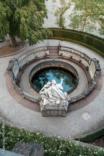 Historic stone monument surrounded by cobblestones at Danube source in Donaueschingen ideal for travel guides