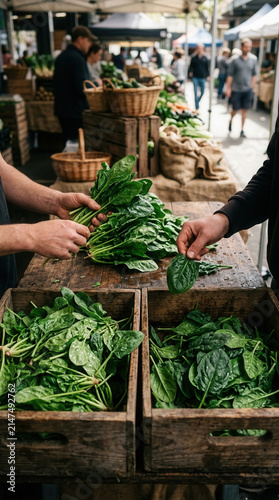 Fresh Green Spinach Being Sold At A Busy Farmers Market Outdoor Stall