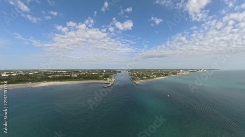 Coastal Aerials: 4K Drone View Flying Over the Ocean Entrance of Jupiter Inlet in Florida