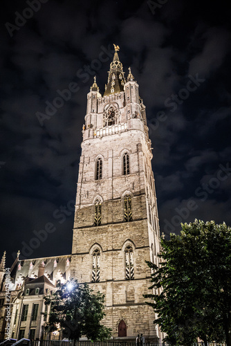Saint Nicholas' Church Illuminated at Night Against a Cloudy Sky in Ghent, Belgium
