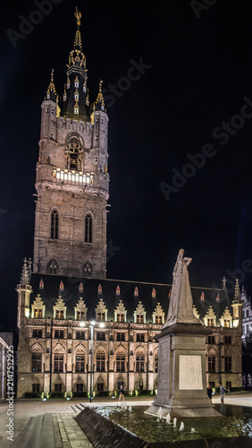 Illuminated Historic Buildings and Saint Bavo's Cathedral at Night in Ghent, Belgium