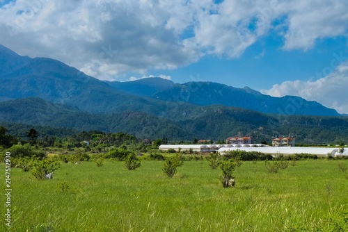 Принти на полотні Modern greenhouse agriculture and pasture in a fertile mountain valley of southw