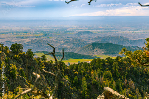 Obraz na płótnie Forested foothills and the wide Gunnison Valley stretch beyond the rim of Black Canyon of the Gunnison NP