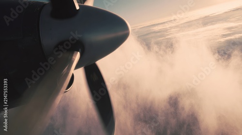 Close up of a plane propeller with vapor effect during flight